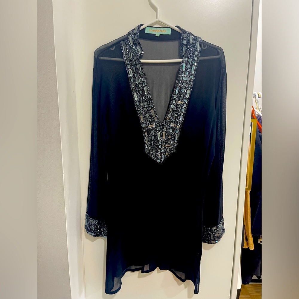 Kareena’s black silk top with beating at cuffs and all along collar.
